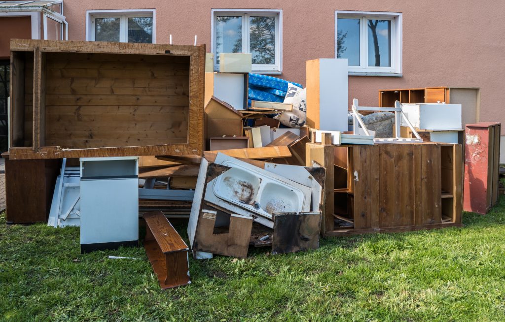 Pile of waste in front of house